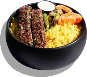 Beef kofta kebab over rice, according to shawarma Abu Omar