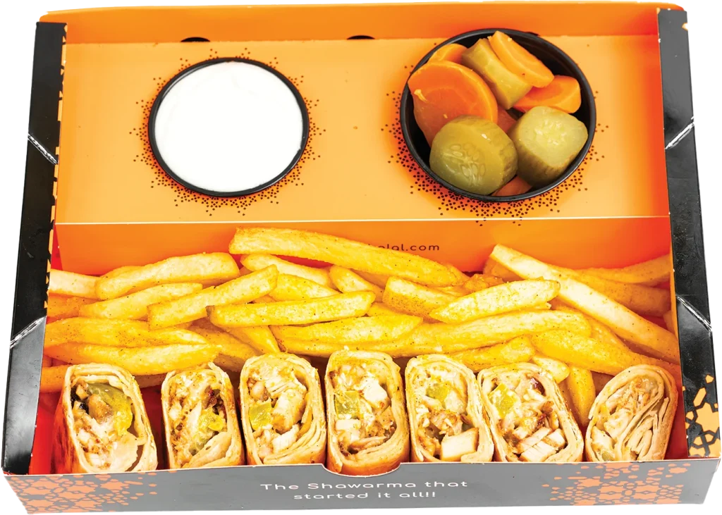 Pressed Arabi wrap of chicken shawarma with cucumber pickles and garlic sauce