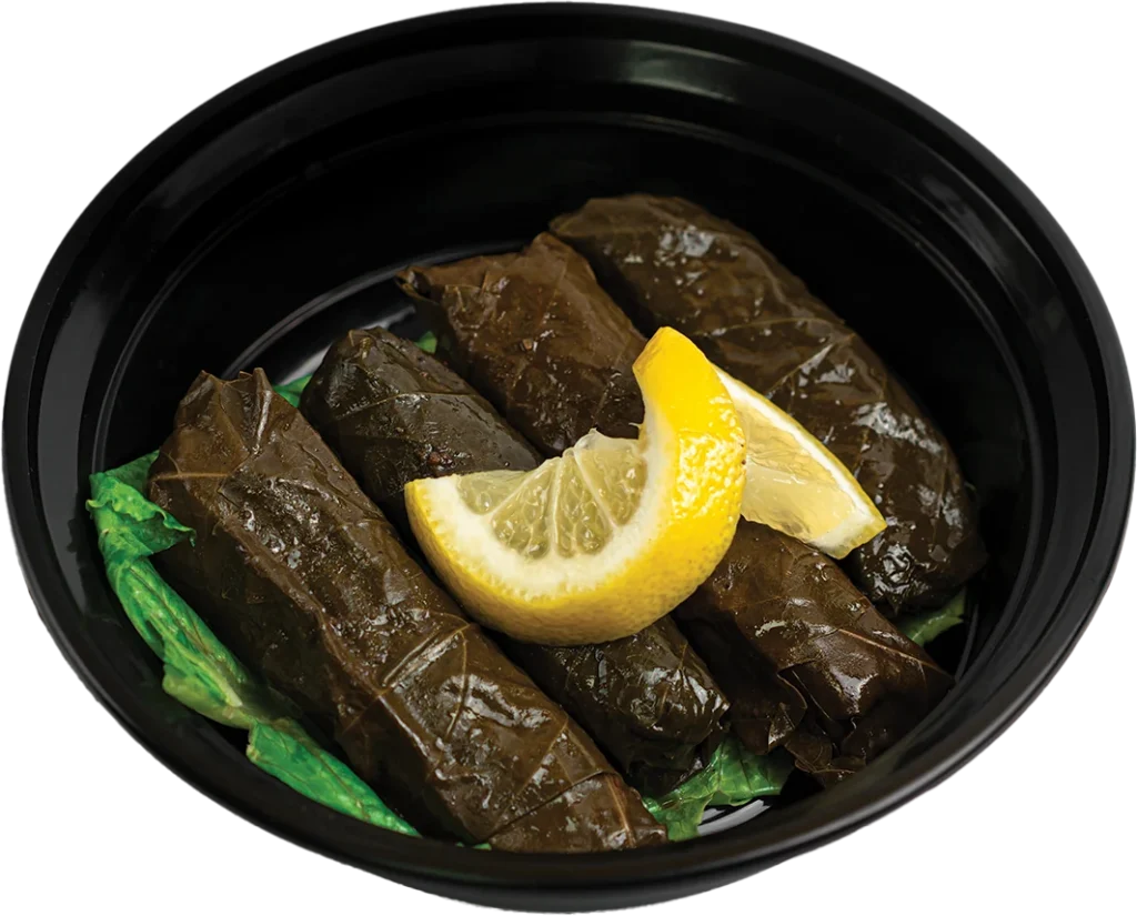 Grape leaves rolled around a savoury herbed rice filling