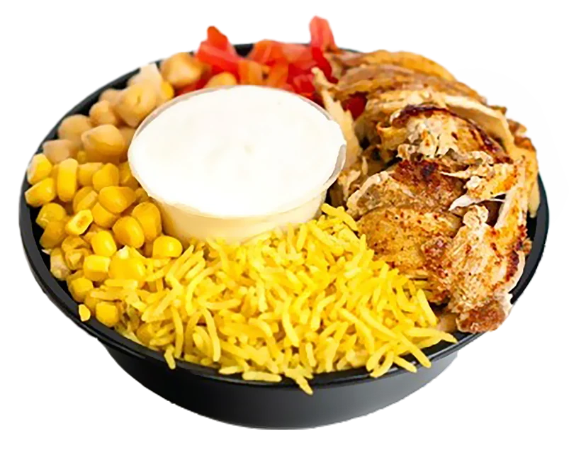 Kid-sized bowl of yellow rice topped with chicken shawarma, tomatoes and garbanzo beans