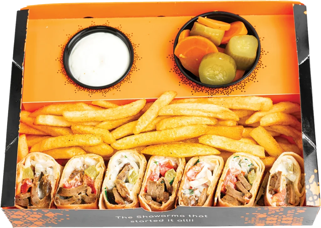 Pressed Arabi wrap of lamb gyro with lettuce, pickles, tomatoes and garlic sauce