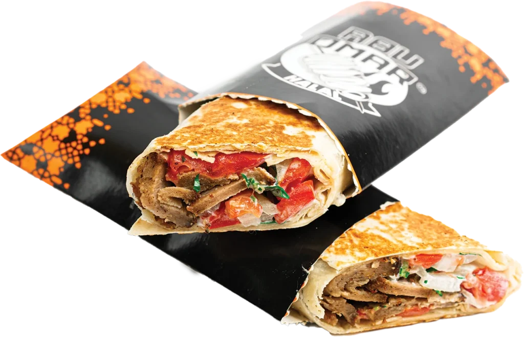 Lamb gyro wrap with shredded lettuce, pickles, tomatoes, onions and garlic sauce